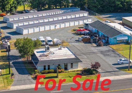 Aerial image of Church Street Self Storage with red text saying For Sale